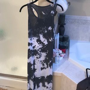 Long maxi dress. It is grey and white.